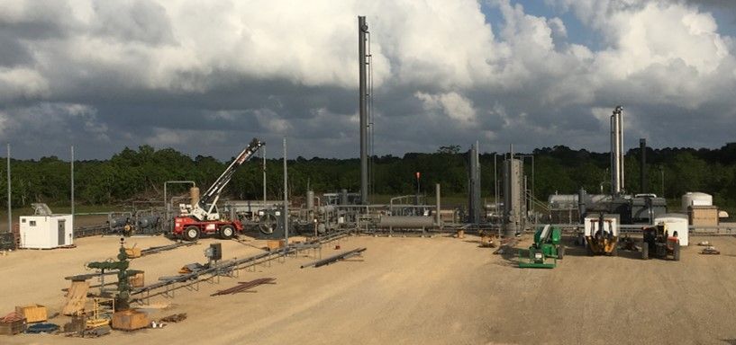 A large construction site with a lot of machinery in it