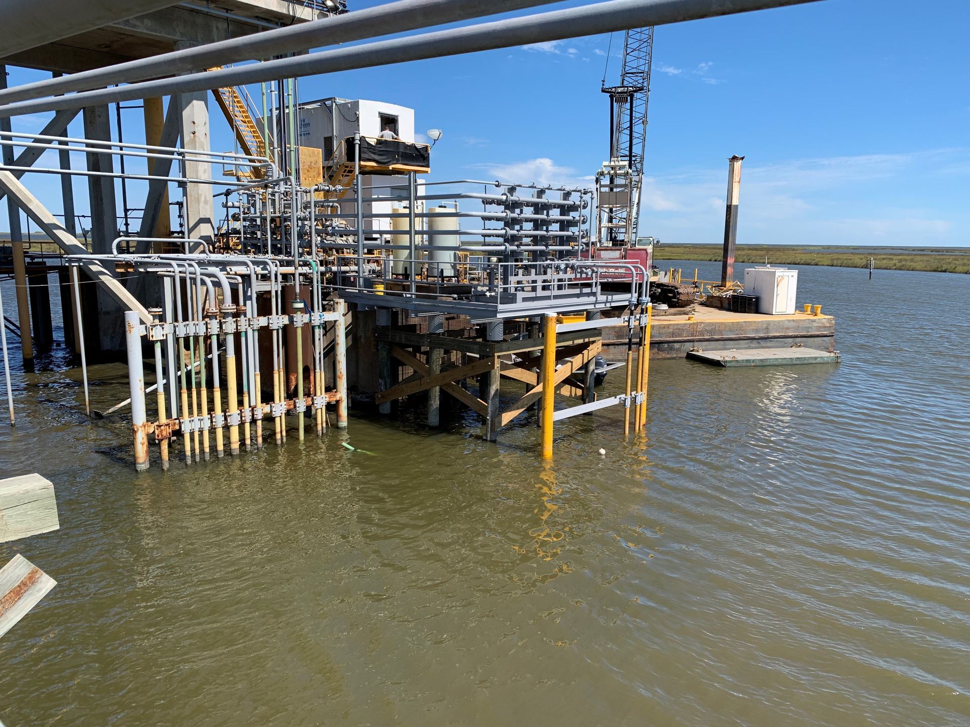 A bridge is being built over a body of water.