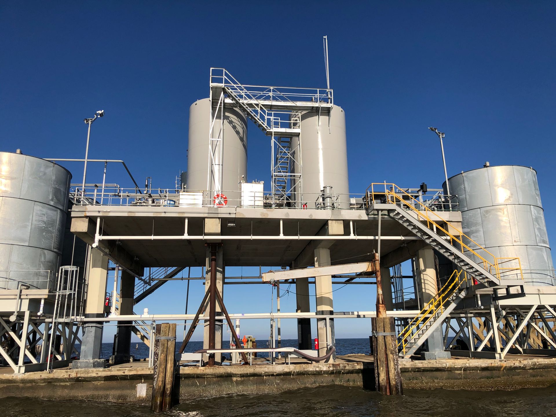A large building with a lot of tanks on top of it