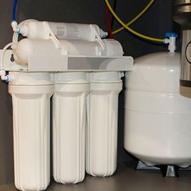 White water filtration system with multiple filters and a storage tank