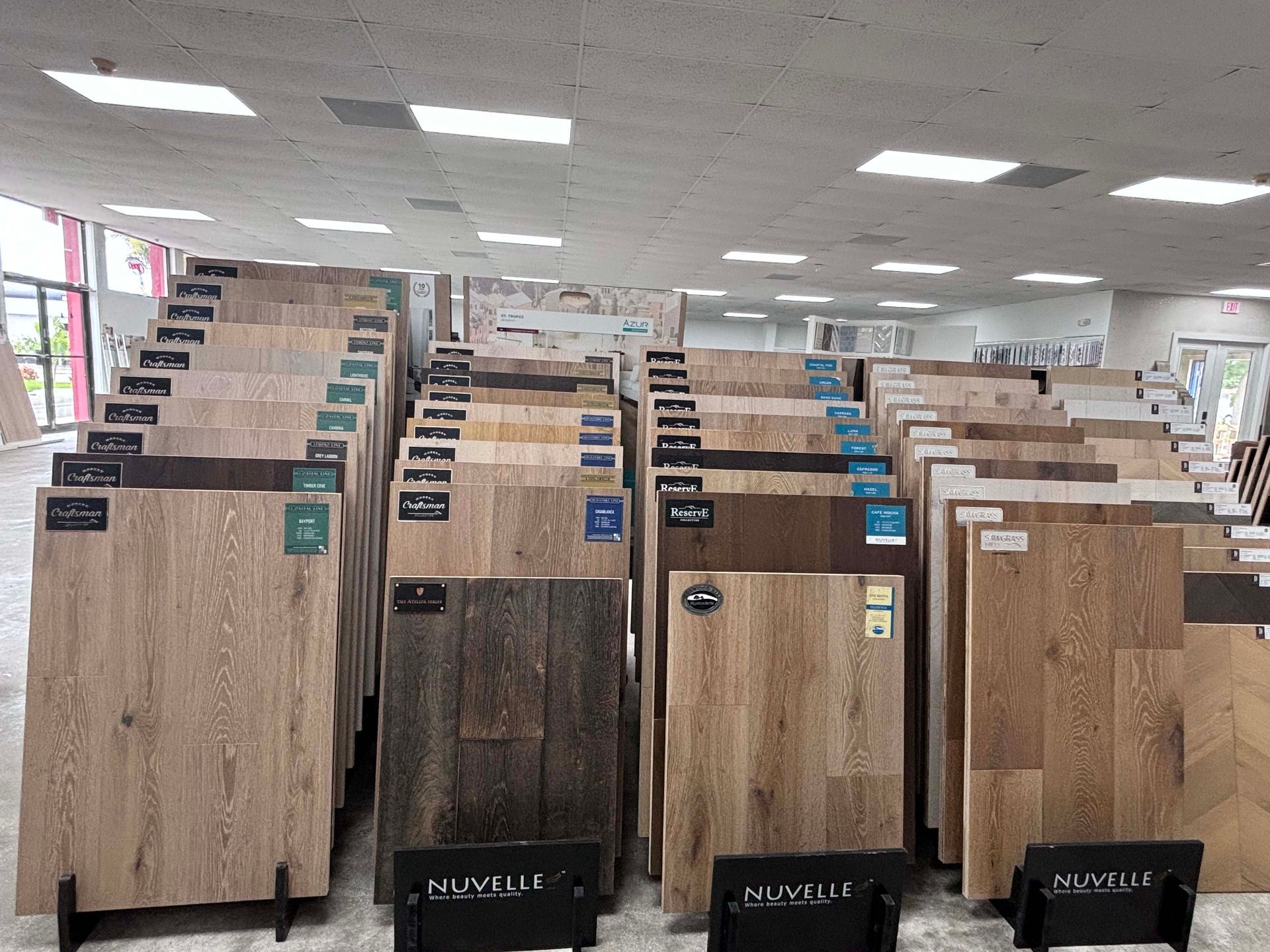 A large room filled with lots of different types of wooden flooring.