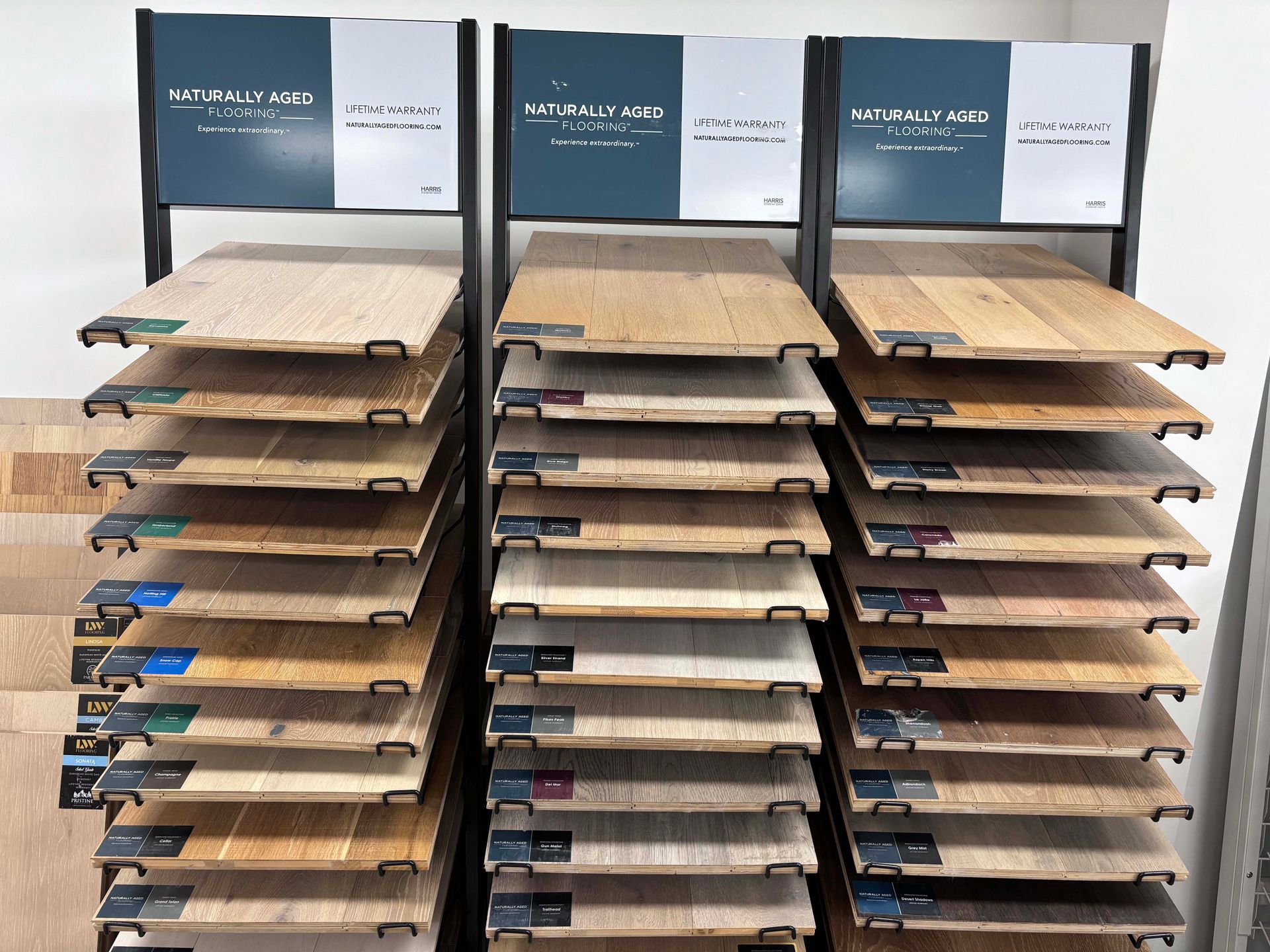 A display of different types of wooden flooring in a store