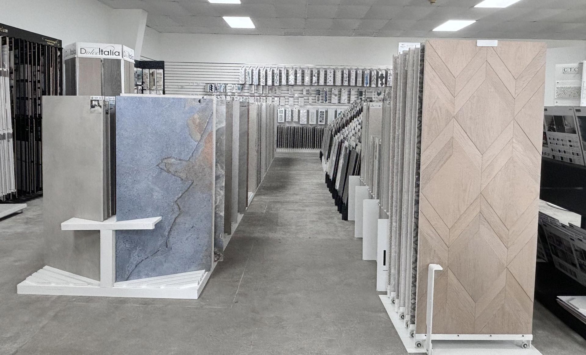 There are many different types of tiles on display in this store.