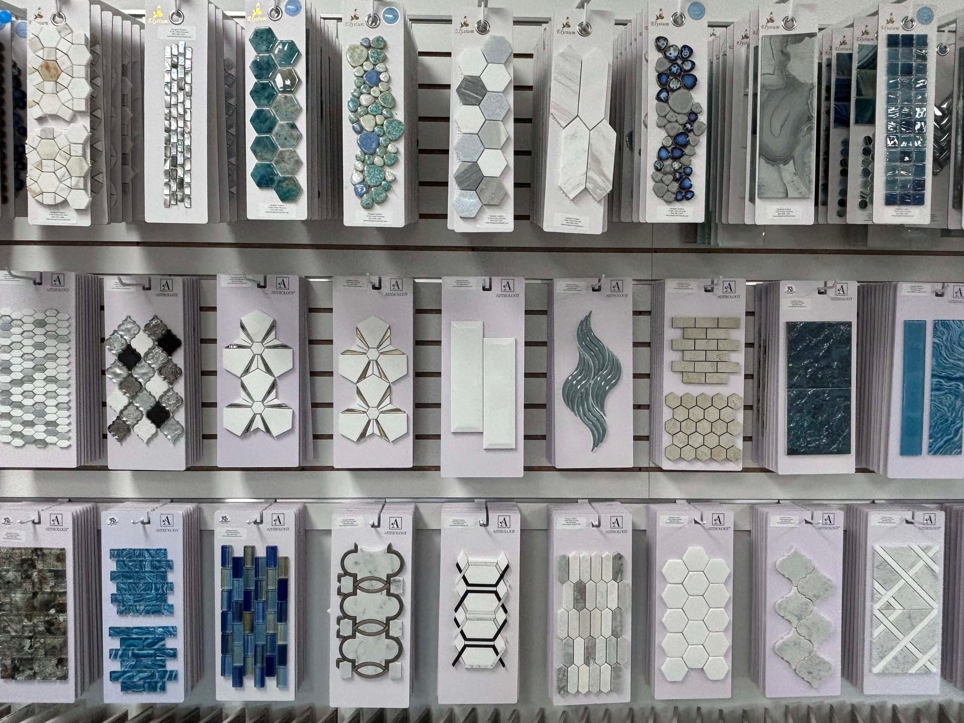 There are many different types of tiles on display in this store.