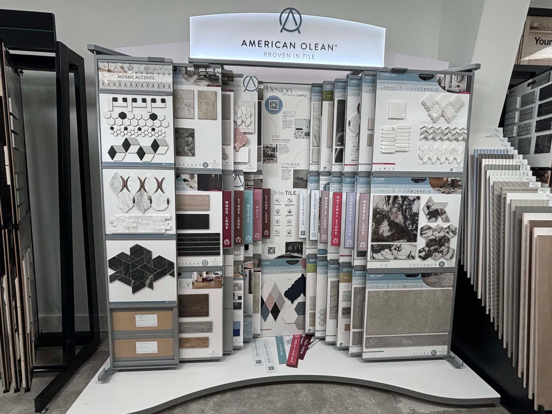 A display of tiles and carpets in a store.