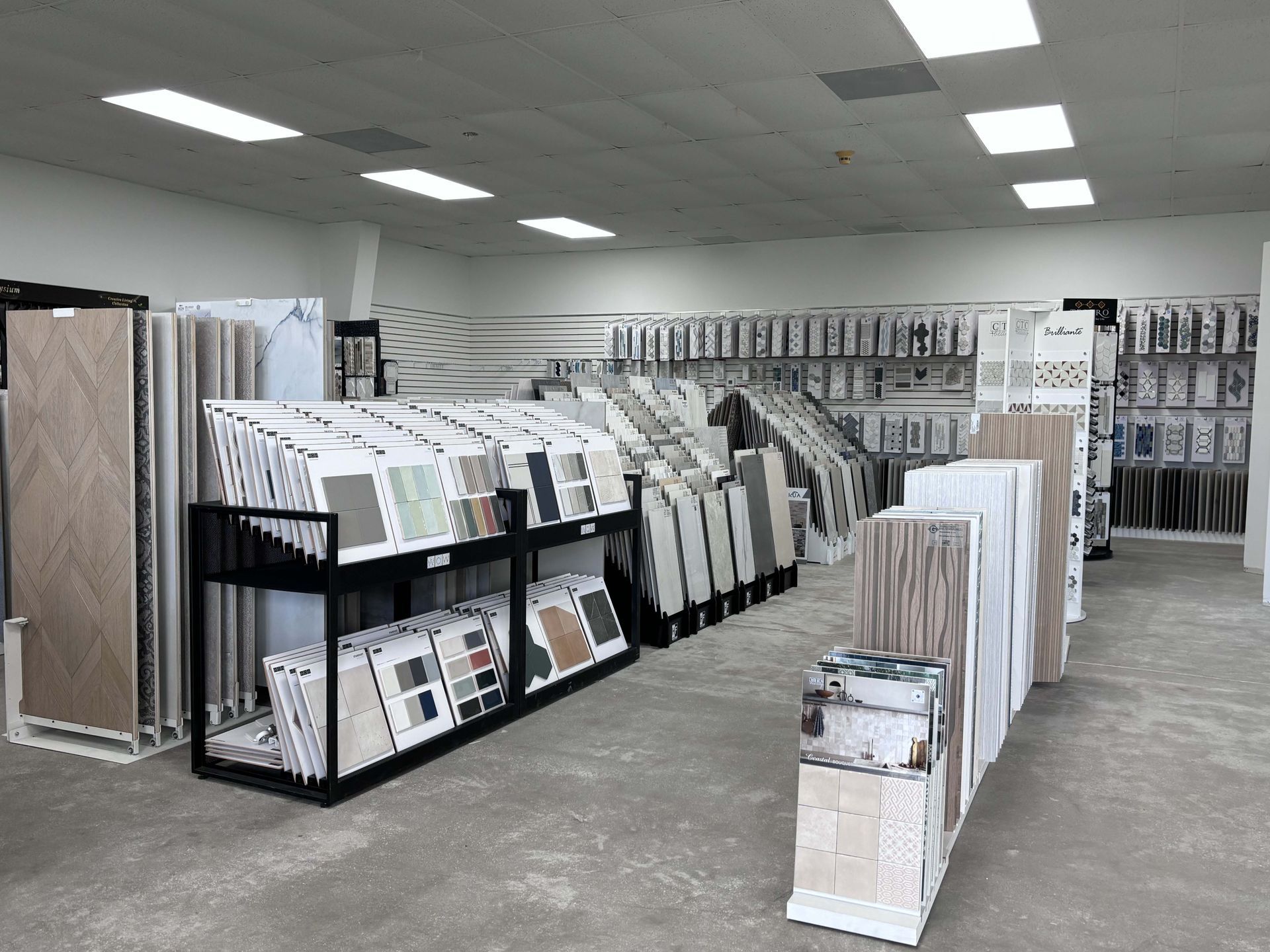 There are many different types of tiles on display in this store.