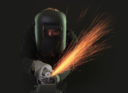 A welder working close up