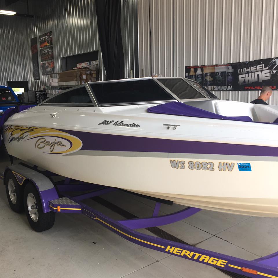 Boat with vehicle wraps