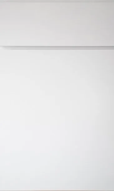 White wall with a horizontal trim line and a top border.