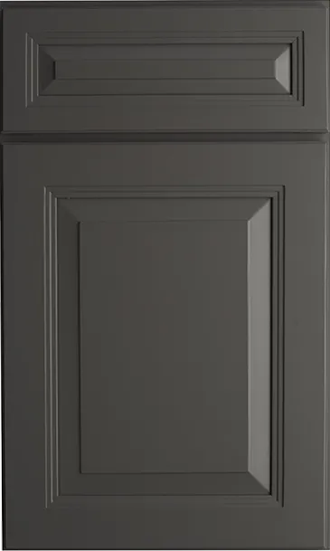 Gray kitchen cabinet door with recessed panel and molding.
