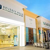 Clean, professional medical spa treatment room with neutral tones at Beverly Hills Rejuvenation Center Houston - River Oaks in Houston