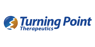 The logo for turning point therapeutics is blue and orange.