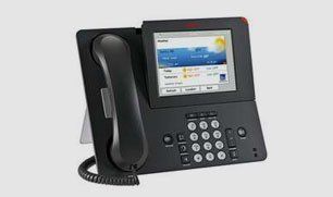 A black telephone with a screen on it on a white background.