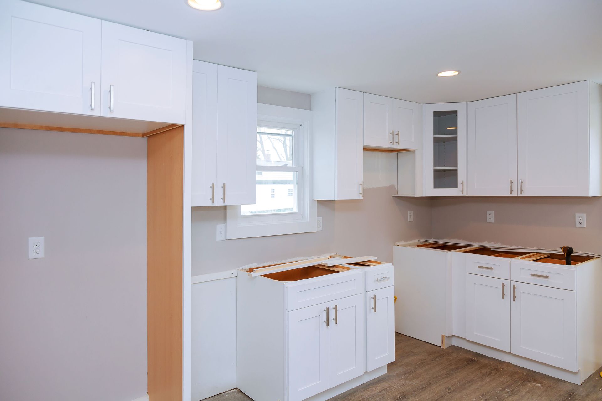 A bathroom with two sinks and two mirrors.