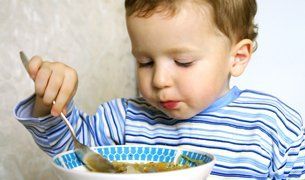 Toddler eating healthy meal