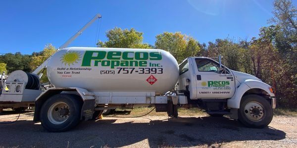 White propane truck with green logo 