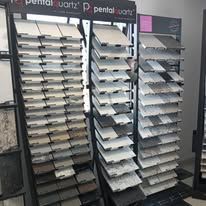 There are many different types of tiles on display in this store.