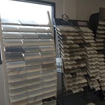 There are many different types of tiles on display in this room.