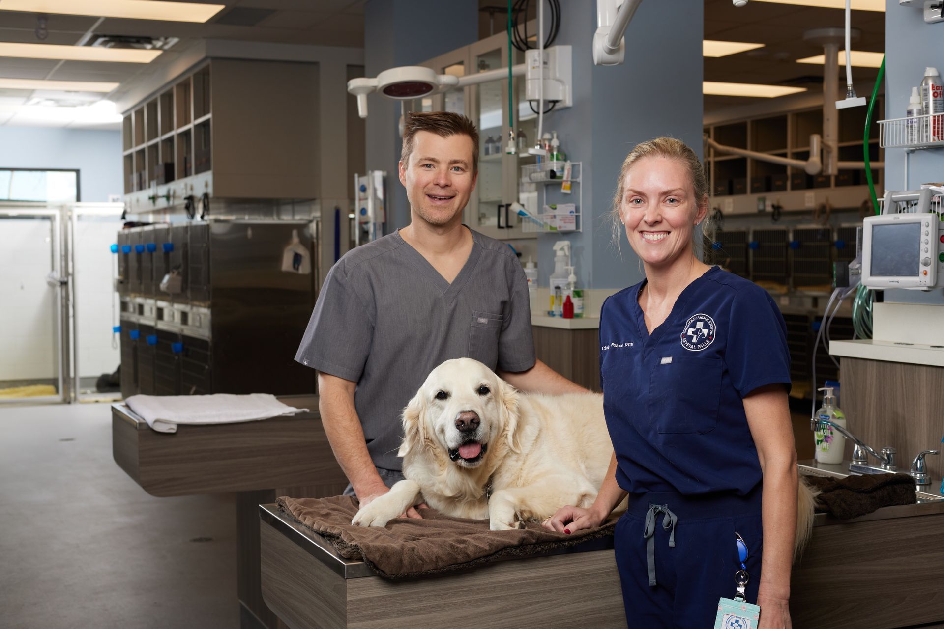 Two veterinarians with a dog