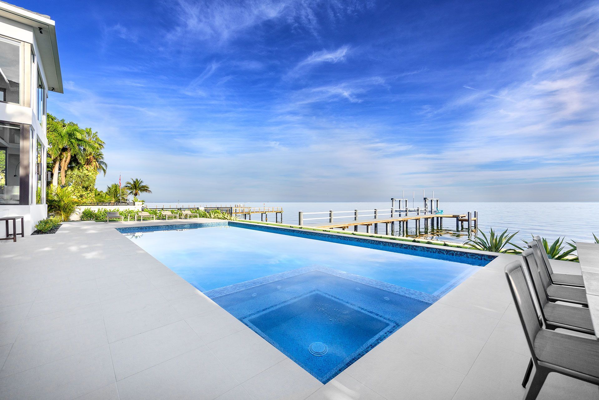 rectangle pool with jacuzzi