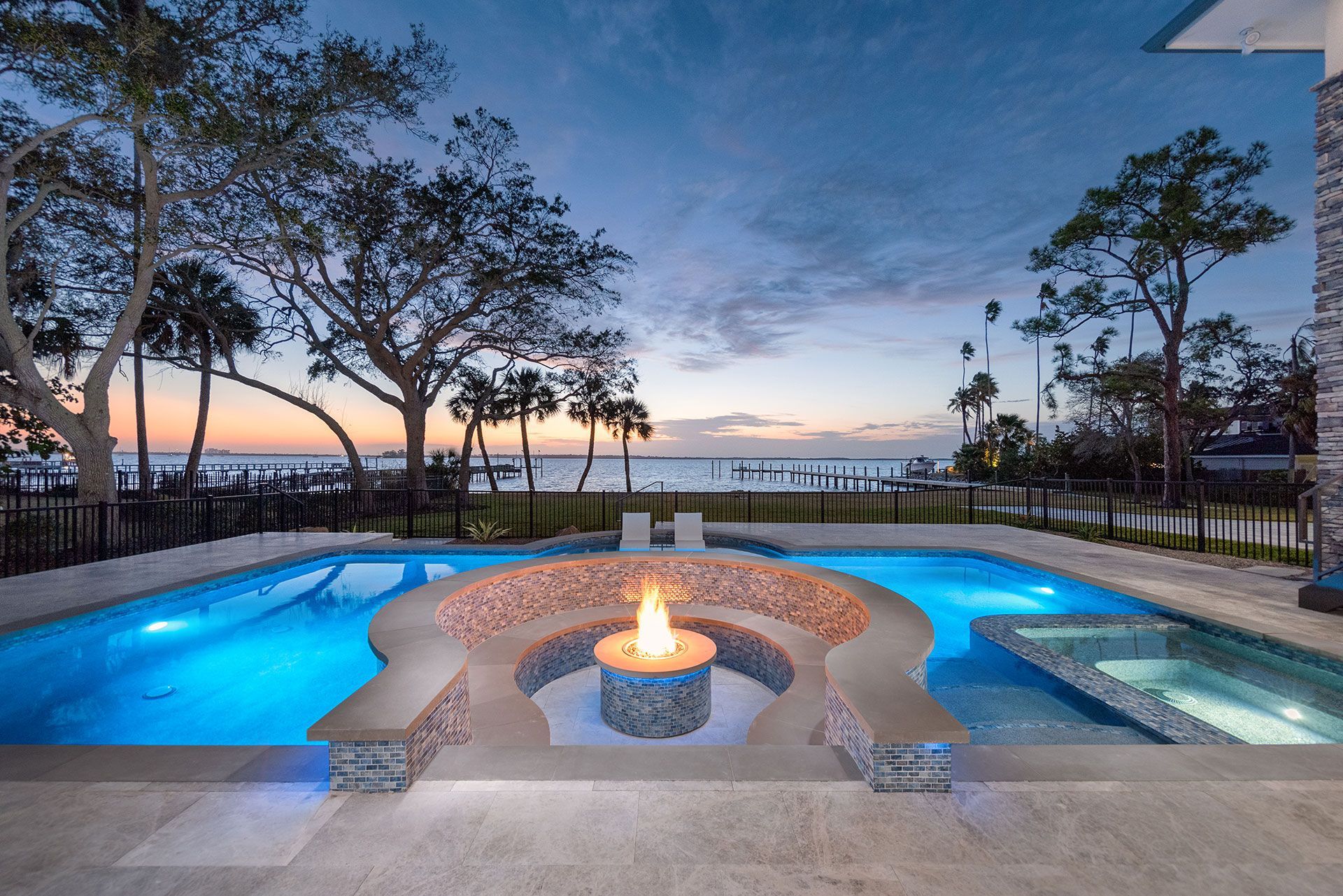swimming pool with sunset view