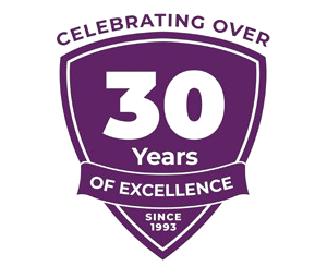 Purple shield logo celebrating over 30 years of excellence since 1993.