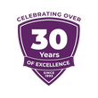 Purple shield badge celebrating over 30 years of excellence since 1993.