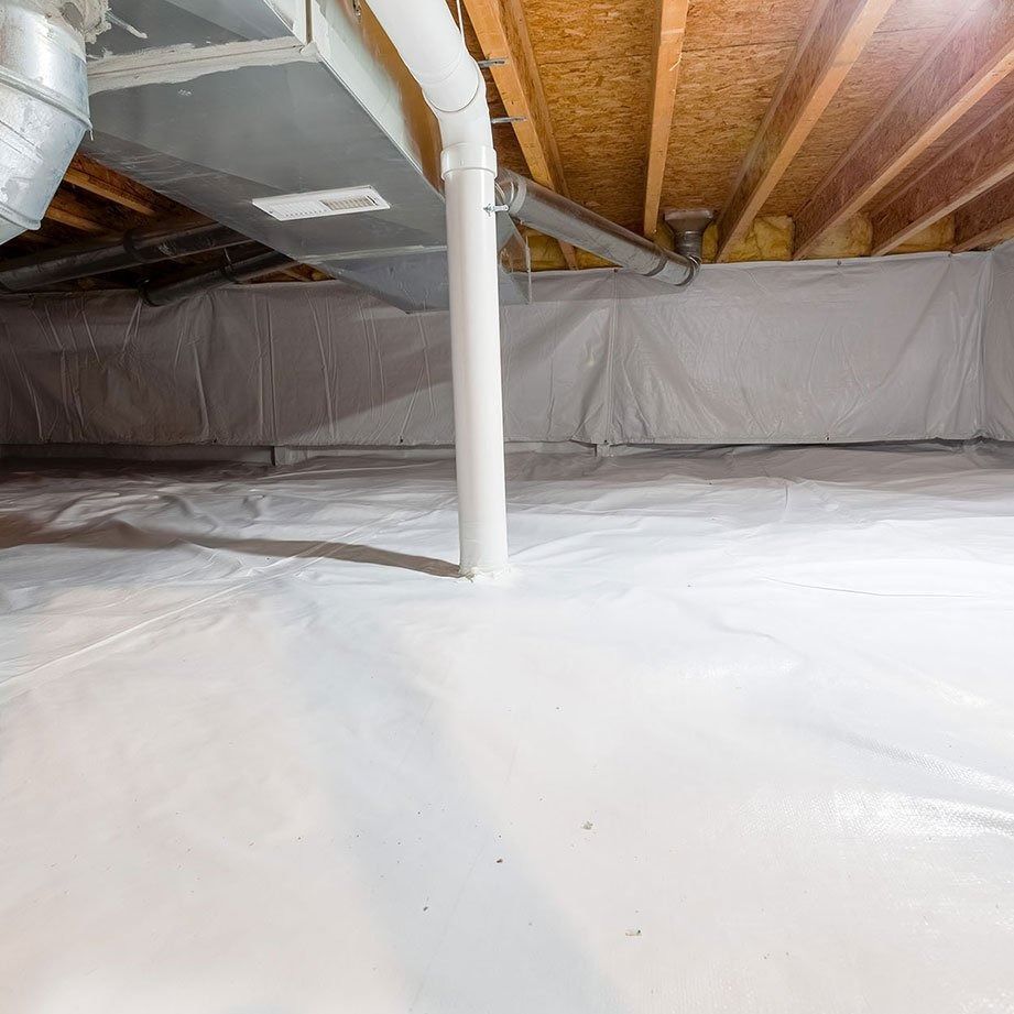 A crawl space featuring white vapor barrier sheeting on the walls and floor, with exposed wooden joists and HVAC ducts.