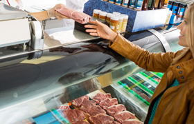 Customer buying meat