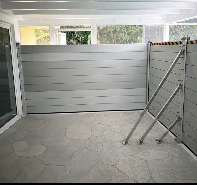 Porch surrounded by flood barriers