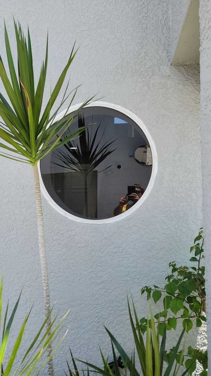 Round wall window on a wall