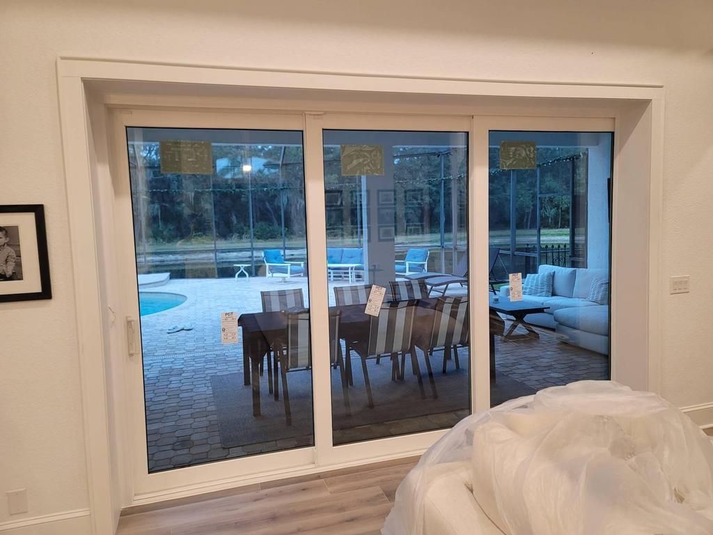 Sliding glass doors opening to a patio
