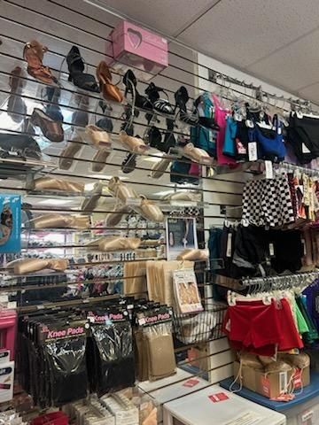 A store filled with lots of clothes and shoes.