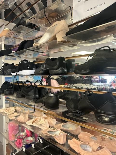 A store filled with lots of different types of shoes.