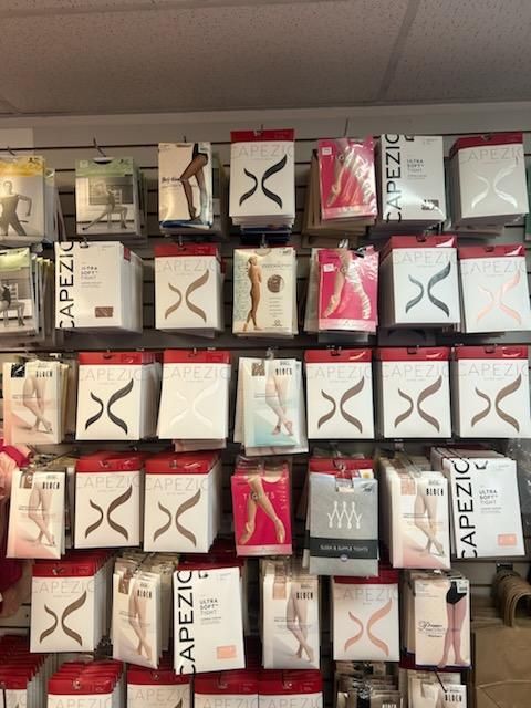 A wall full of boxes of capezic tights