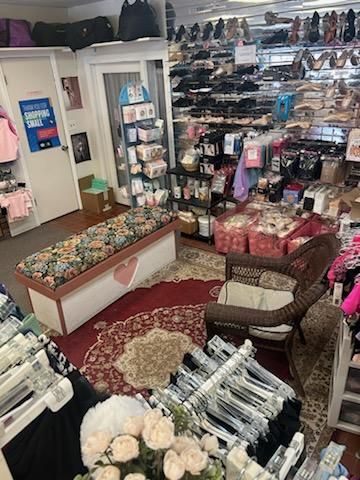 A store filled with lots of clothes and shoes.