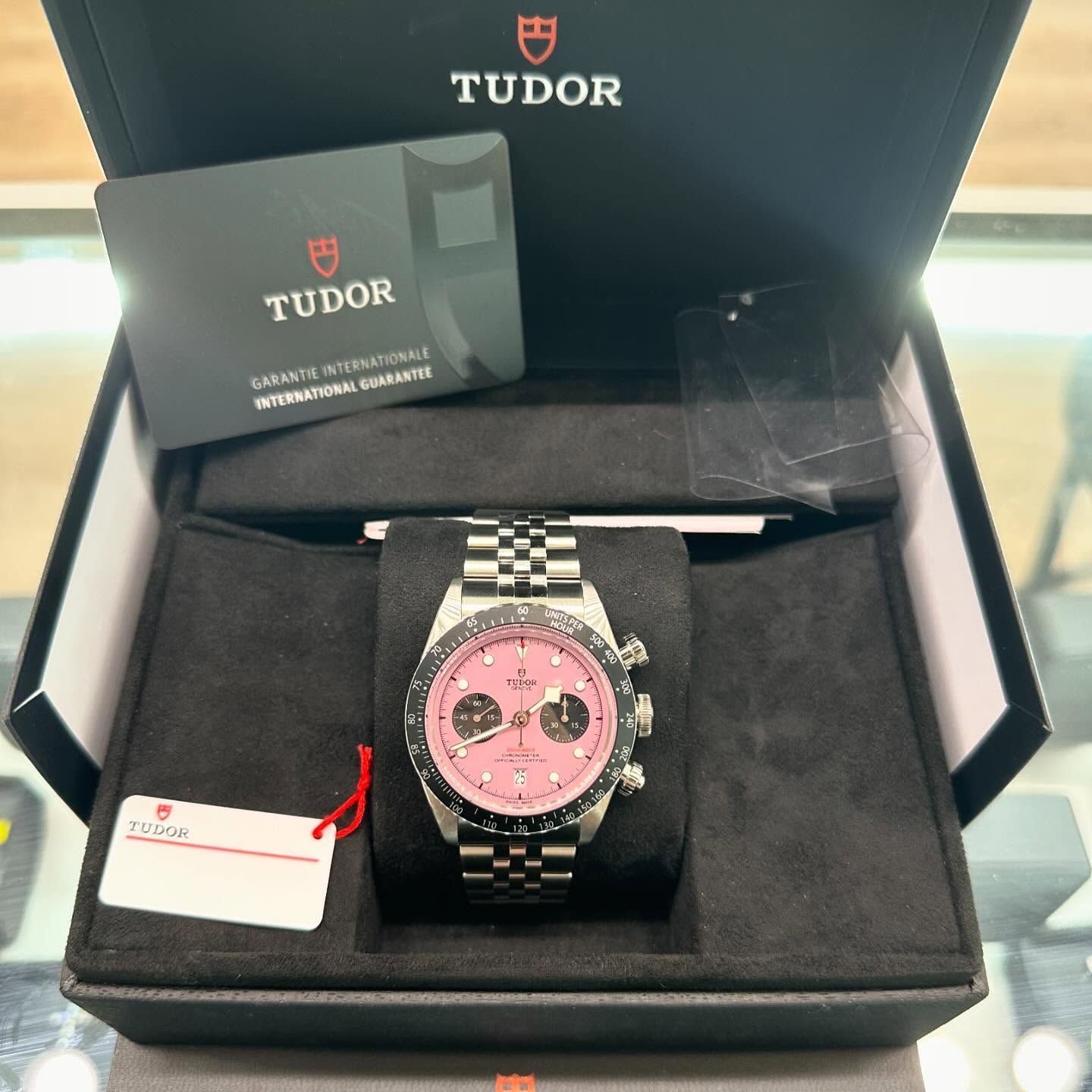 Tudor watch in open box, silver bracelet with pink dial and card tag