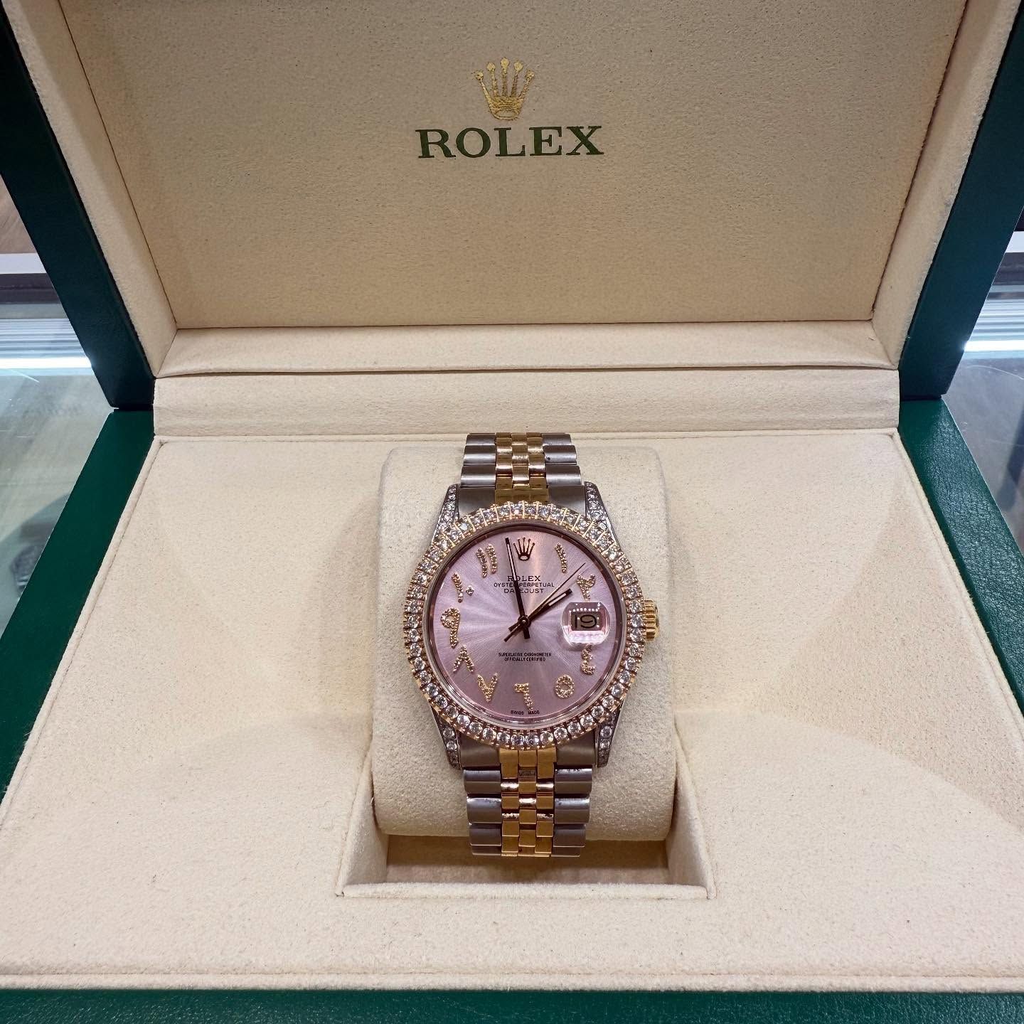 Rolex two-tone wristwatch in an open presentation box