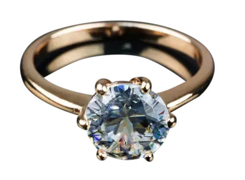Gold ring with a round clear gemstone solitaire