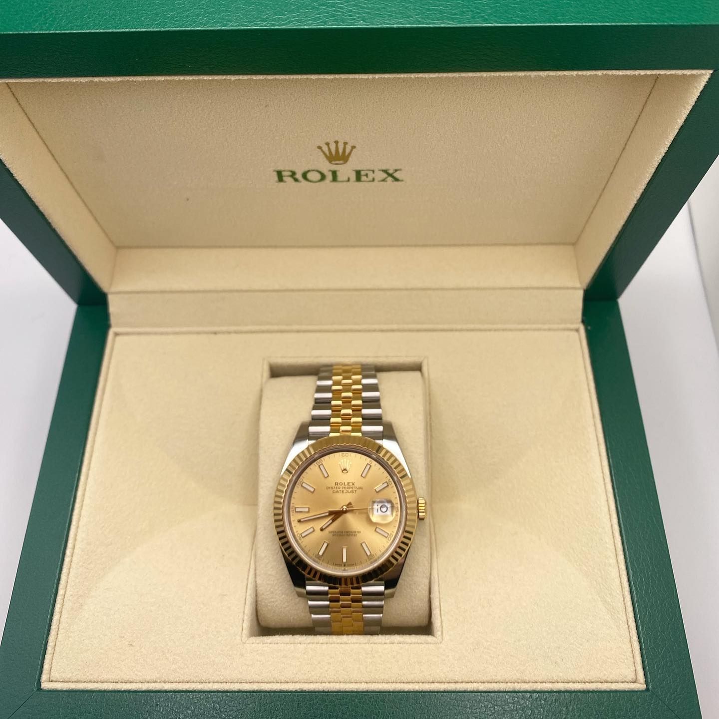 Rolex two-tone gold and silver watch in an open presentation box
