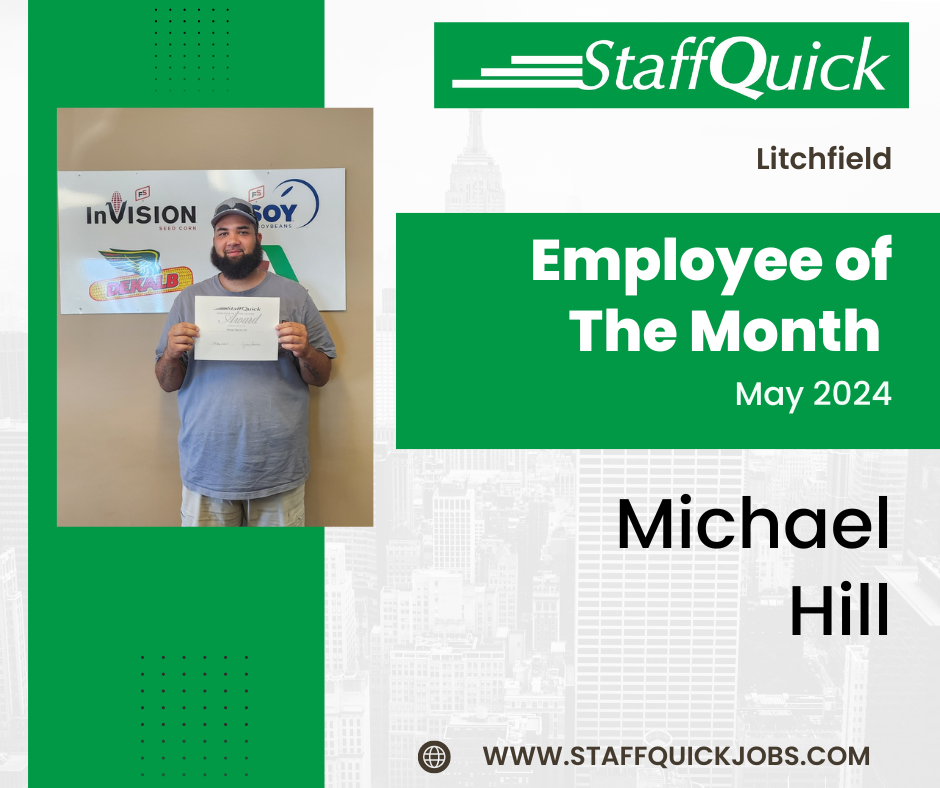 A man is holding a certificate that says employee of the month