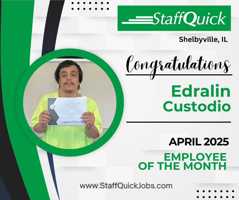 A man in a yellow shirt is holding a certificate.