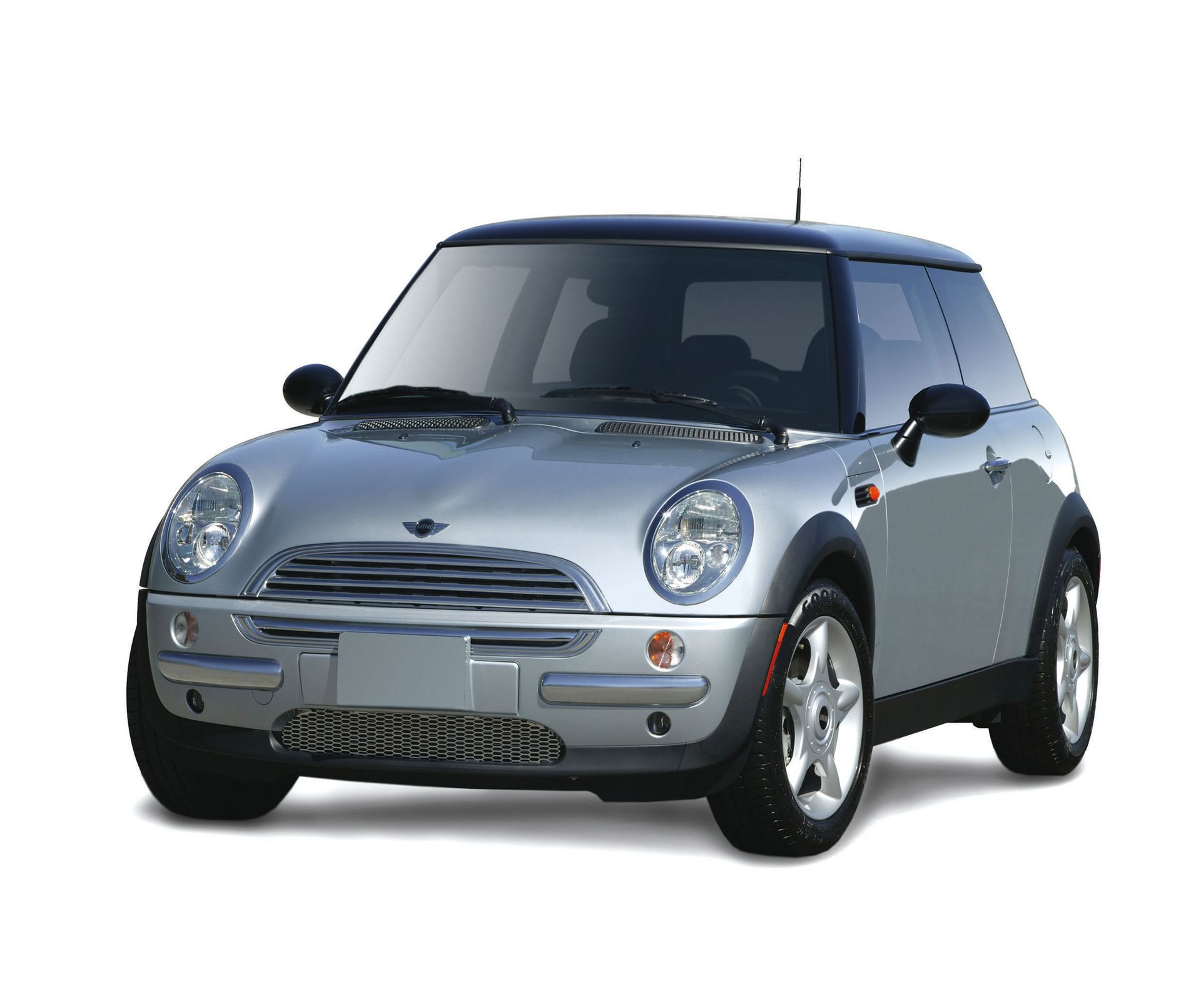 A silver Mini Cooper is shown on a white background.