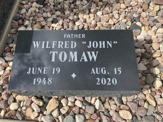 A flush flat bevel grave marker