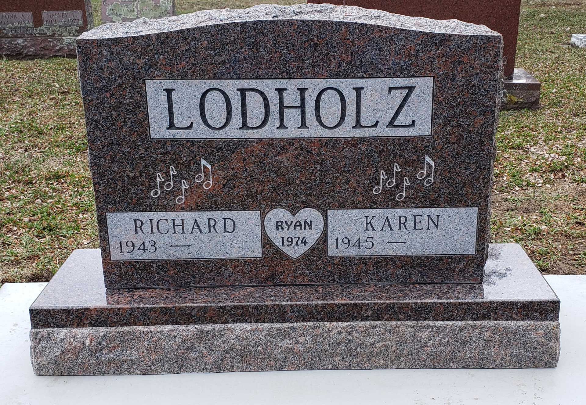 A gravestone in a cemetery
