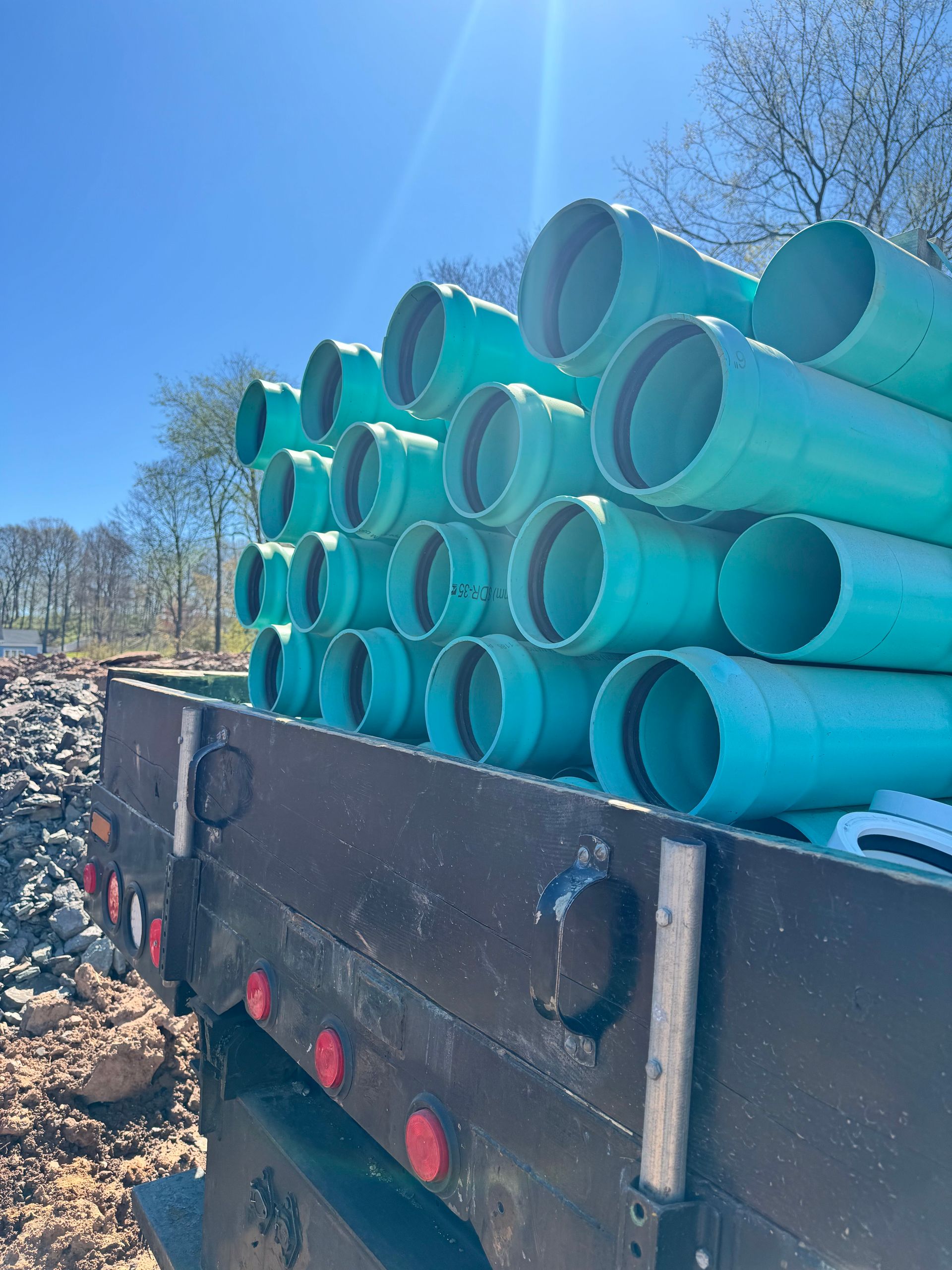 Excavator demolishing home