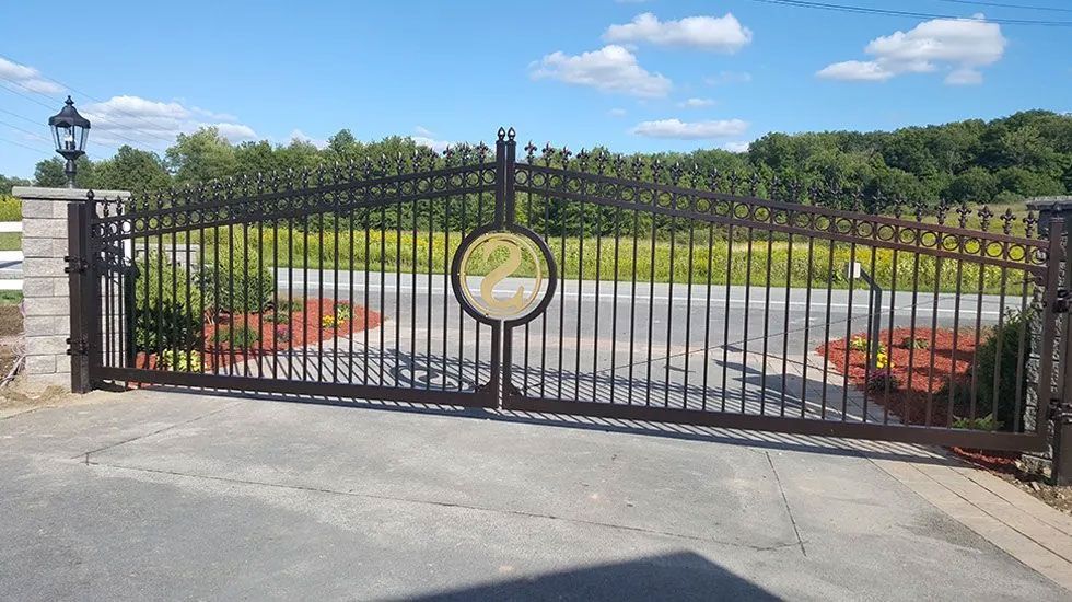 A wrought iron gate with a circle in the middle of it