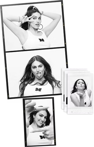 Three black-and-white portrait photos in frames, plus a small white instant photo printer with a photo printing out