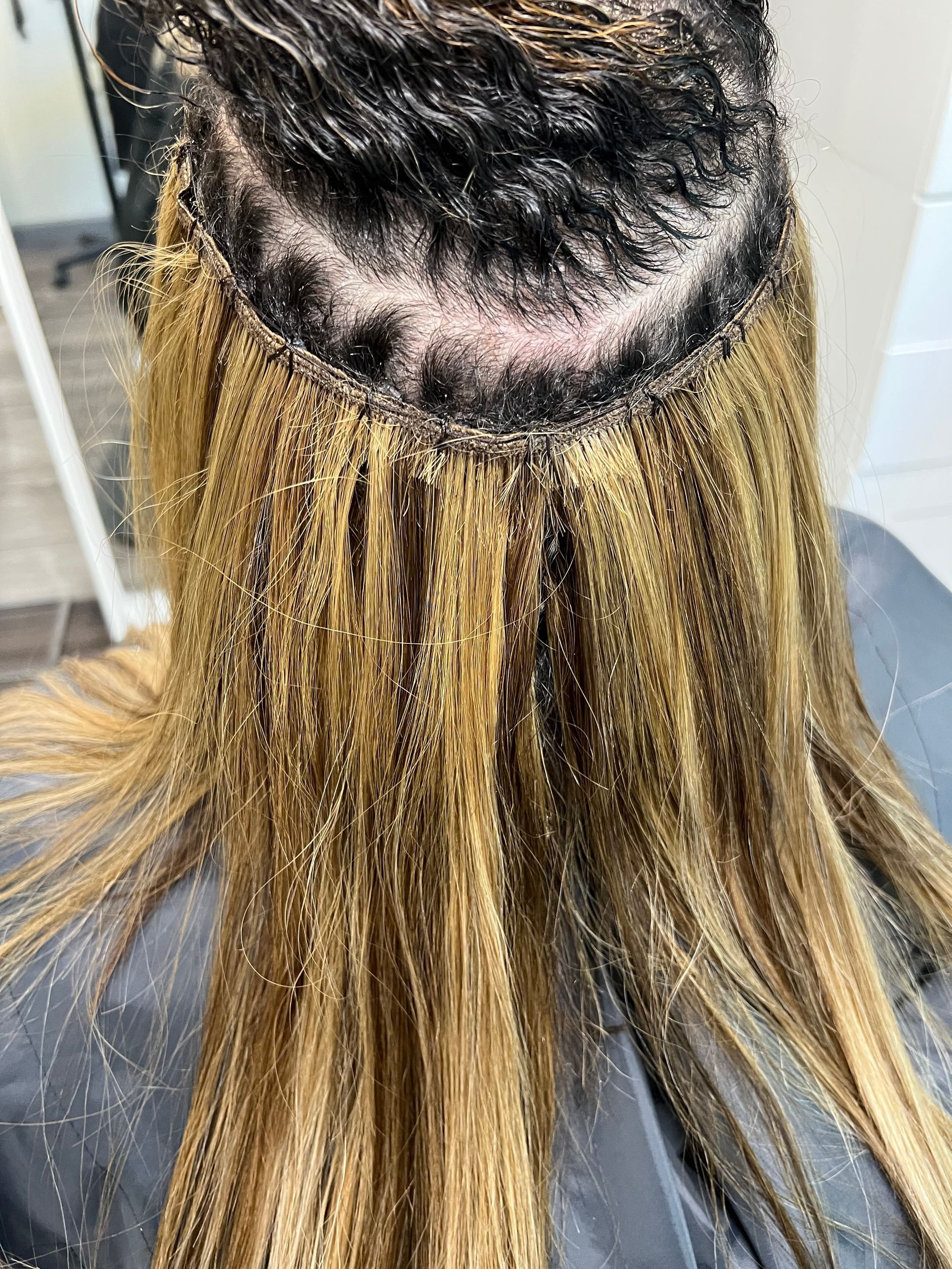 A close up of a woman 's hair in a salon.