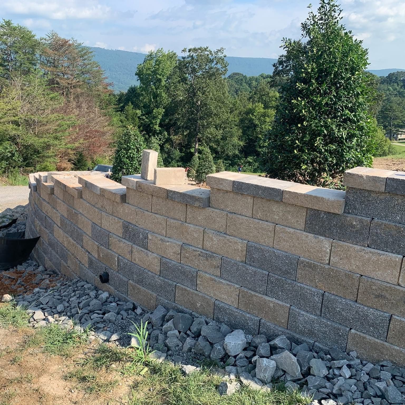 A large house with a large lawn.